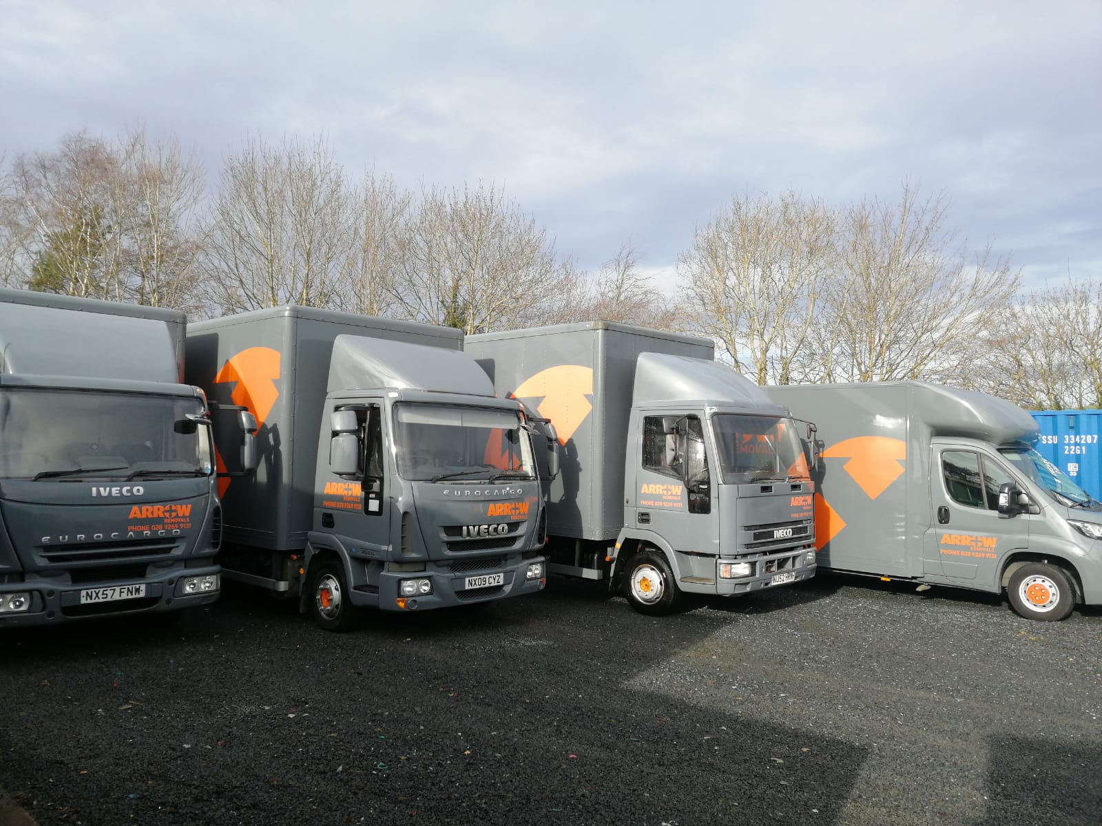 Arrow Removals team carefully securing furniture inside a removals vehicle